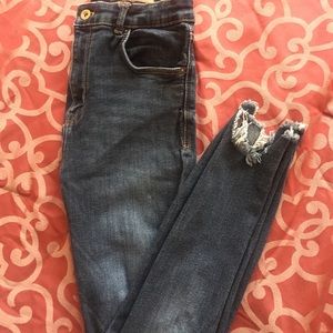 Distressed high waisted dark denim jeans